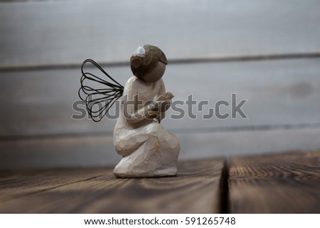 the angel on the wooden board Royalty-Free Stock Photo #591265748