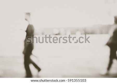 Picture blurred of people walking in the street