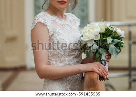 Bride holding springtime bouquet