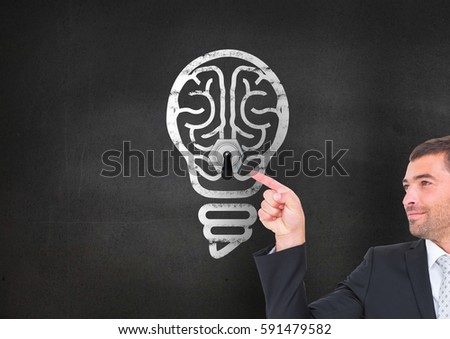 Digital composite image of businessman touching button with light bulb on black background
