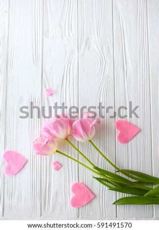 Mother's Day, woman's day. tulips on wooden background. Royalty-Free Stock Photo #591491570