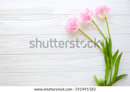 Mother's Day, woman's day. tulips on wooden background. Royalty-Free Stock Photo #591491582