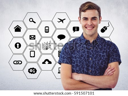 Digital generated image of male executive standing with arms crossed against application icons