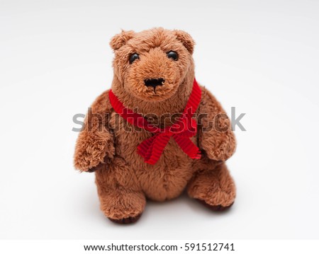 Teddy bear with red bow