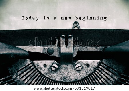 Today is a new beginning words typed on a vintage typewriter in black and white.  Royalty-Free Stock Photo #591519017