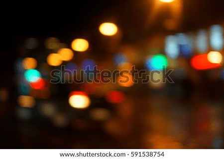 Night city lights blur. Retro toned photo, vintage