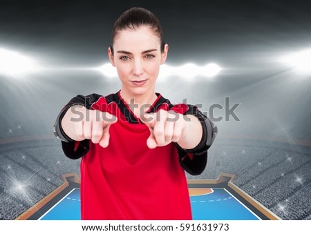 Digital composite image of female athlete gesturing against stadium background