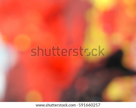 bright spots, defocused background, cheerful colors, red bokeh, paint strokes, blurred background, warm colors, a sense of celebration.