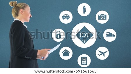Digital composition of businesswoman holding digital tablet against cloud computing concept in background