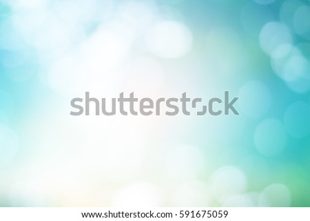 blurred glowing teal color background.