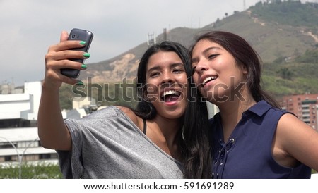 Teen Female Friends Taking A Selfie