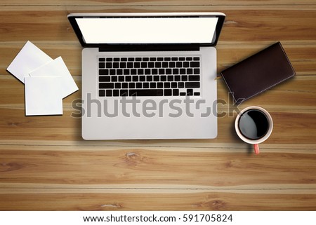 Work office desk with a cup of coffee computer laptop