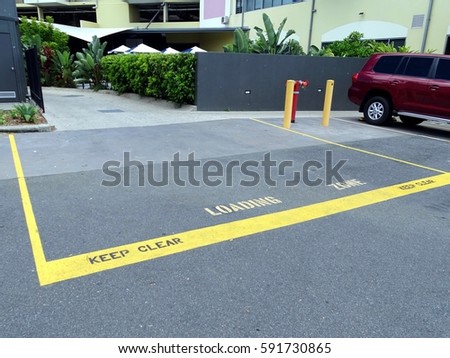 Loading Zone area prohibiting parking in a commercial car park