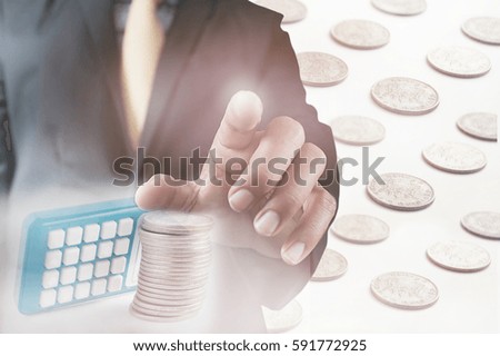 Double exposure of businessman hand working on touch screen concept, stock exchange