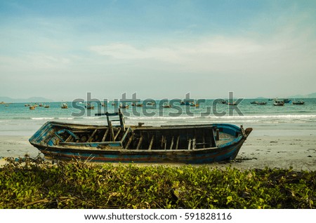 Wreck on tropical beach with fishing 