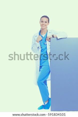 A female doctor with a blank billboard
