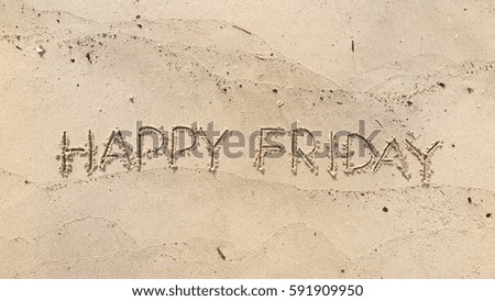 Handwriting words "HAPPY FRIDAY" on sand of beach