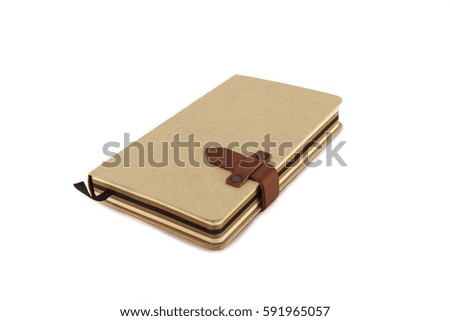 Isolated notebook with a red leather locker.
