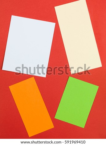 Illustration of Four Rectangular Text Blocks Against a Red Background
