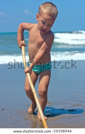 The boy on the beach, summer.
