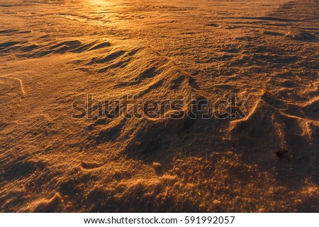 Martian sunset (Mars planet) red landscape. Looks like cold desert on Mars. A huge field of ice