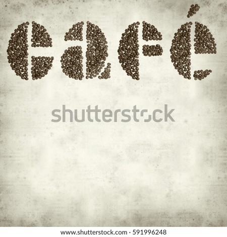 textured old paper background with letters made of coffee grains
