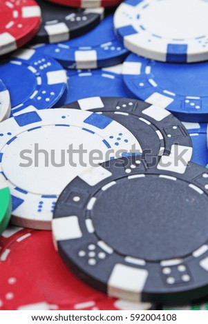 Casino poker money chips texture. Stack of poker chips as background. 