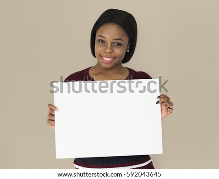 African Descent Woman Smiling Holding Paper