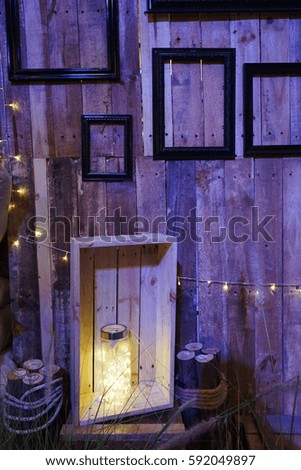 picture Frame and wooden wall and lamp