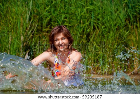 beautiful girls playing in water
