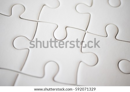 Grey jigsaw puzzle using as background education or business concept.