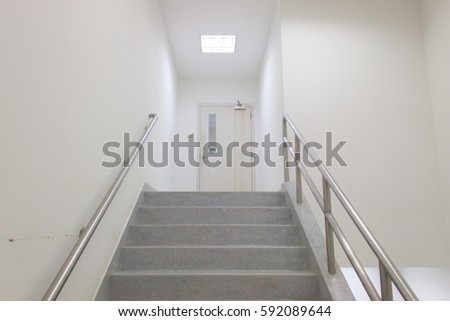 Emergency Exit in workplace, stairwell in a modern building