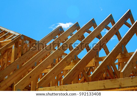 wooden roof construction, symbolic photo for home, house building