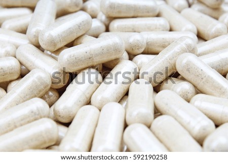 Medical or vitamin pills.grey medicine pills as texture. Pill pattern background.