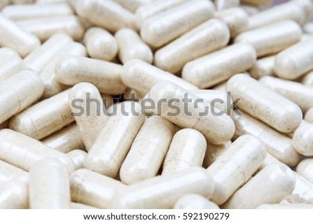 Medical or vitamin pills.grey medicine pills as texture. Pill pattern background.