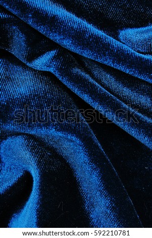 Velvet dress material cloth texture pattern. 
tailoring stitching concept. Shiny beautiful fashion fabric. Shiny clothing material sample.Creased fabric.