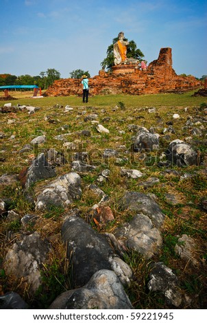 Old stupa and rock foreground in thailand. it is good for tourism