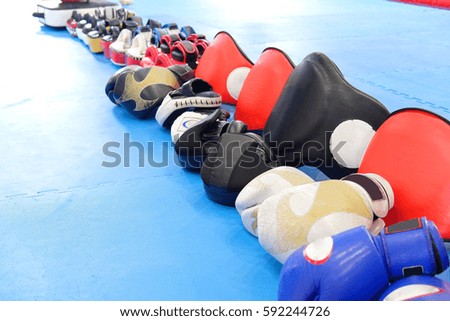 Boxing gloves and other boxing equipment close up