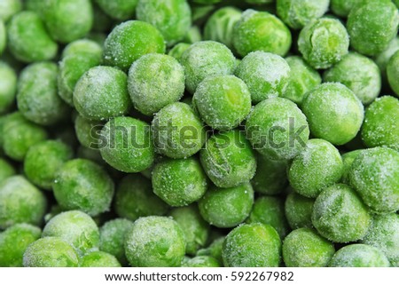 Frozen pea peases texture background. Green pease background pattern.