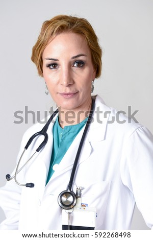corporate portrait of beautiful and happy woman md doctor or nurse posing smiling cheerful with stethoscope in health care and hospital clinic work staff concept isolated background