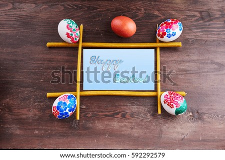 Frame made of candles with a hand-painted Easter eggs