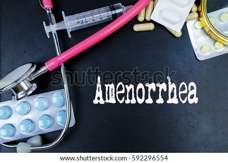 Amenorrhea word, medical term word with medical concepts in blackboard and medical equipment background