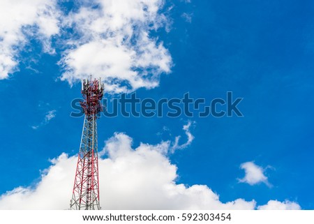 Telecommunication tower, Phone antenna with white cloud and blue sky background
