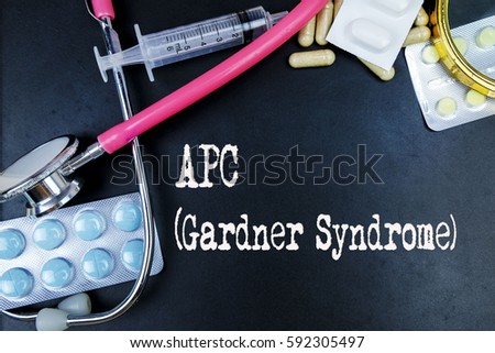 APC (Gardner Syndrome) word, medical term word with medical concepts in blackboard and medical equipment background
