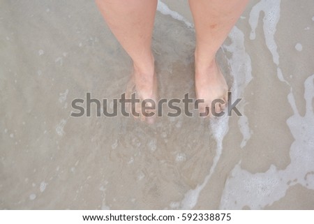 feet in water beach