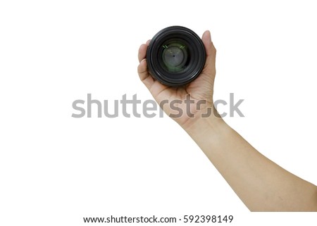 man hand holding camera lens : Travel concept. ,isolated on white.