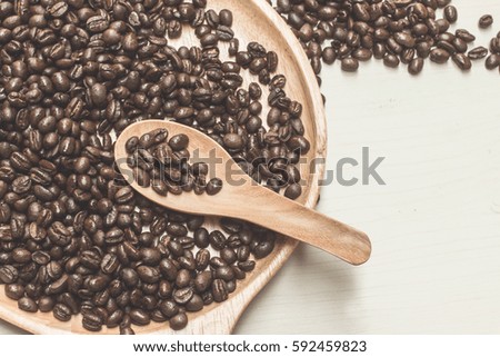 coffee  beans in my spoon can do  many coffee cup