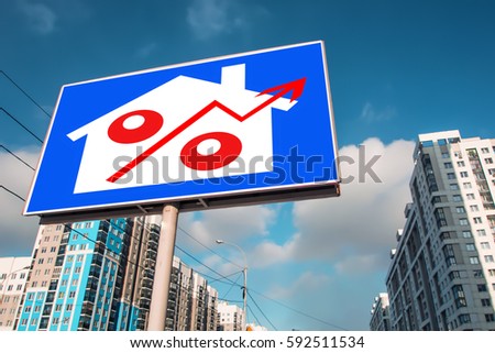 A Billboard advertising the sale of real estate . The concept of changing real estate prices