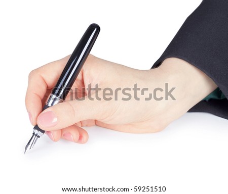 Female hand holds pen