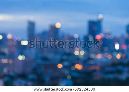 Defocused city office building blur light night view, abstract background